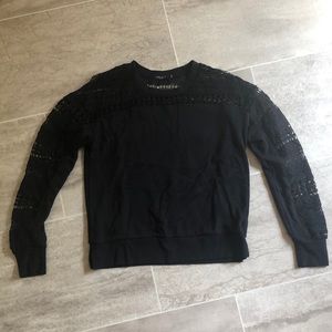 Long sleeve lace sweater.